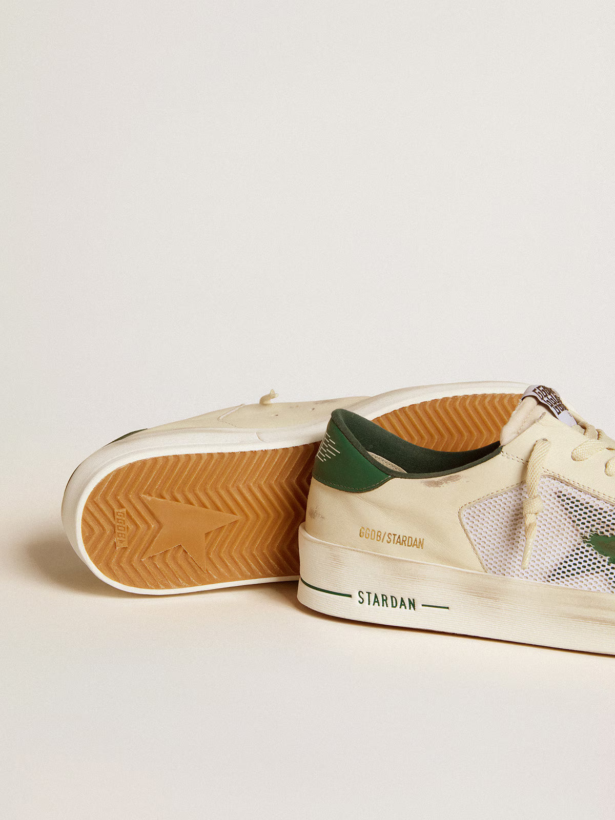 Stardan in suede e rete bianchi con stella e talloncino in pelle verde