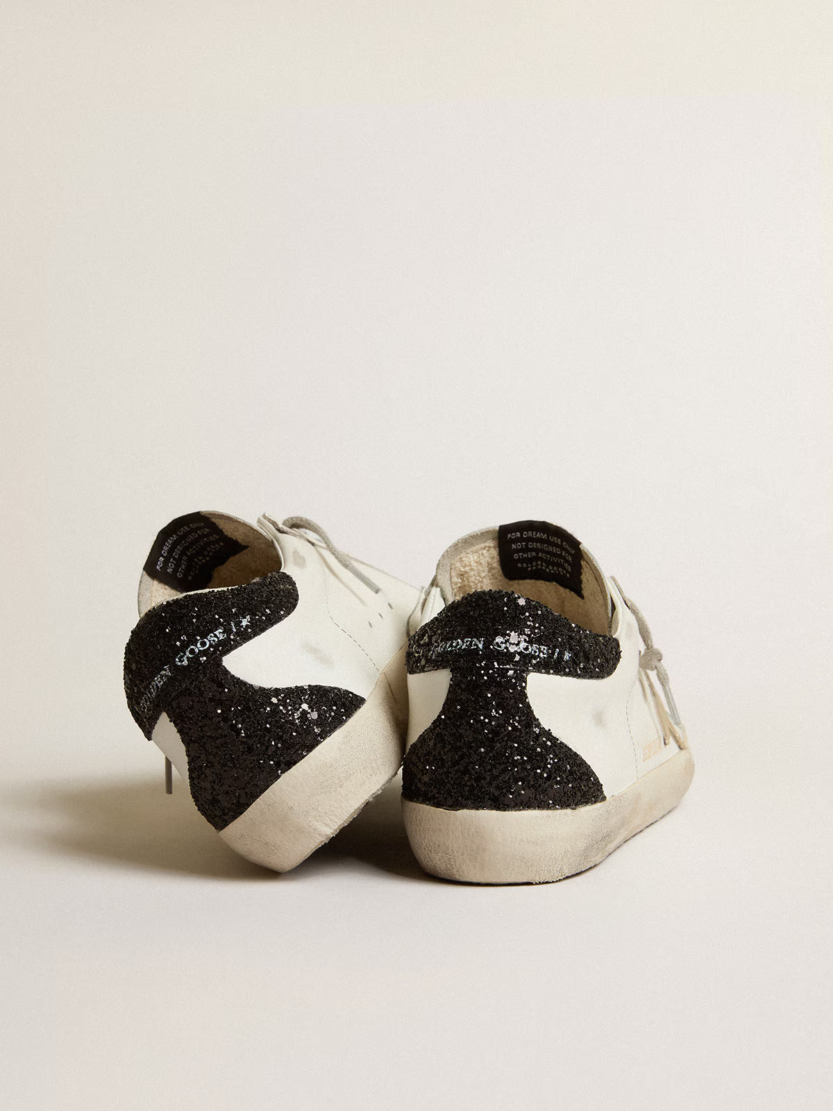 Super-Star Donna con stella oro e talloncino in glitter nero